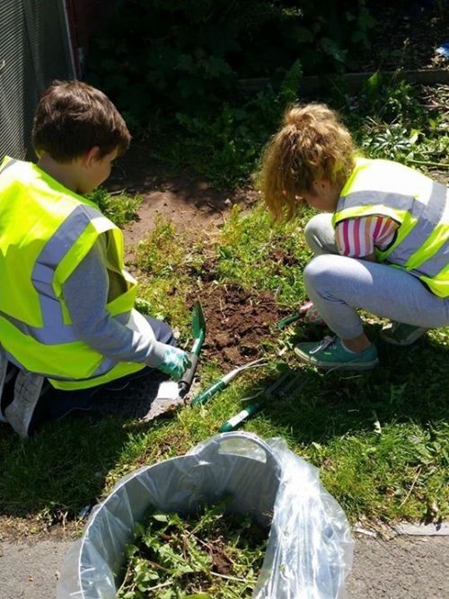 Exwick children enjoying helping