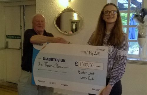 Lion President Dave Lyon handing a cheque for £1000 to Ruth Tandy,for Diabetes Research