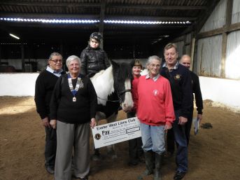 President Lion Carol Wells with Inky and fellow Lions